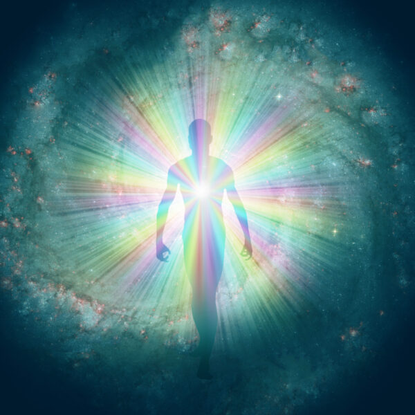 Man figure in rainbow light and stars. Soul or aura